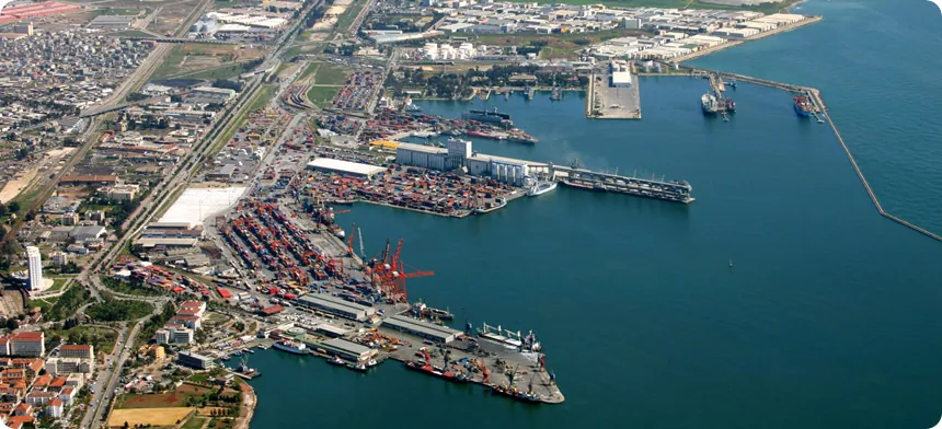 Aerial view of Mersin port, with container terminals and berths along the coast.
